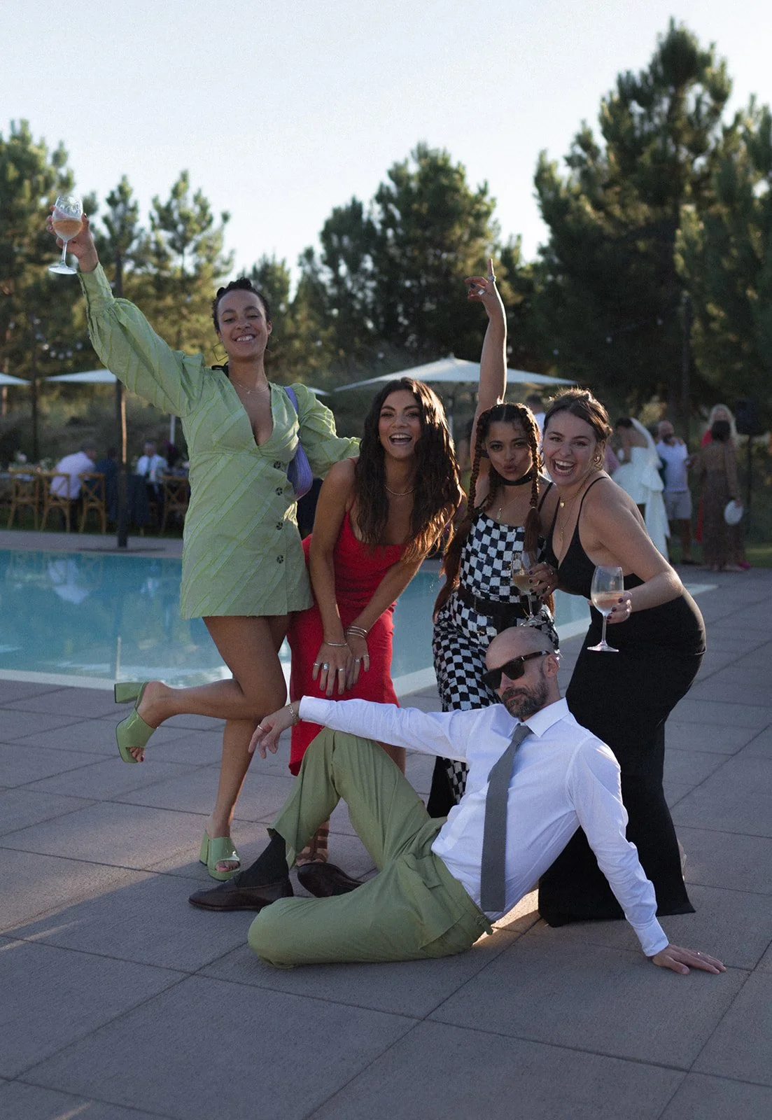 Guests poolside at golden hour, Spatia Comporta, wedding photography by The Lopes Photography, published in Together Journal