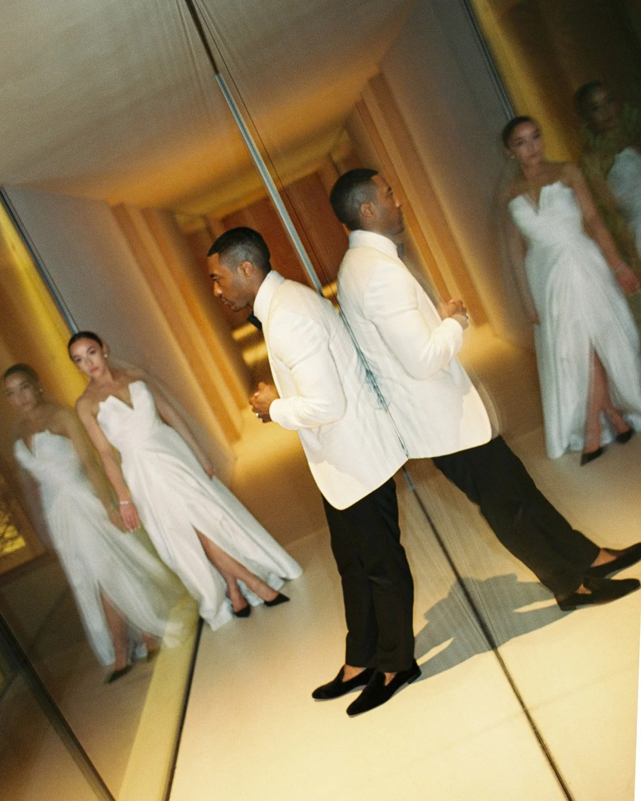 Film and digital wedding photography in Portugal showing editorial direction, movement, and architectural atmosphere during a destination celebration