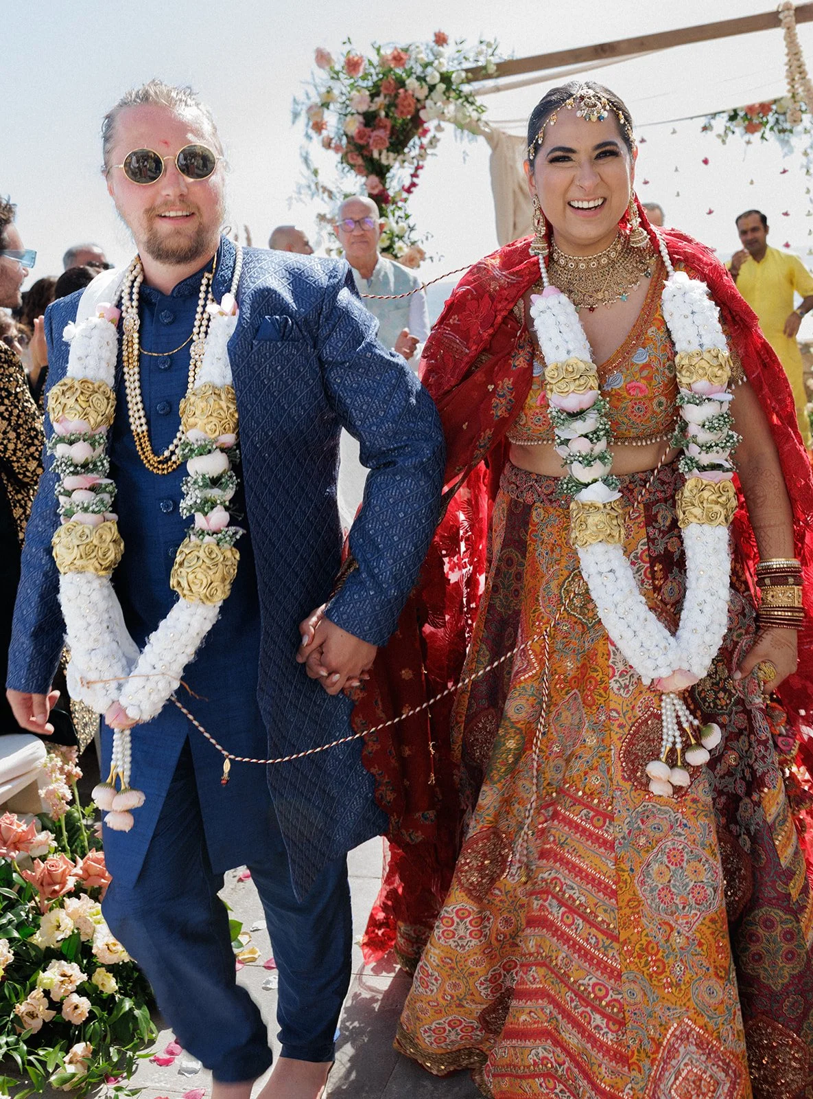 Indian wedding varmala exchange at Fortaleza do Guincho, Cascais, by The Lopes Photography