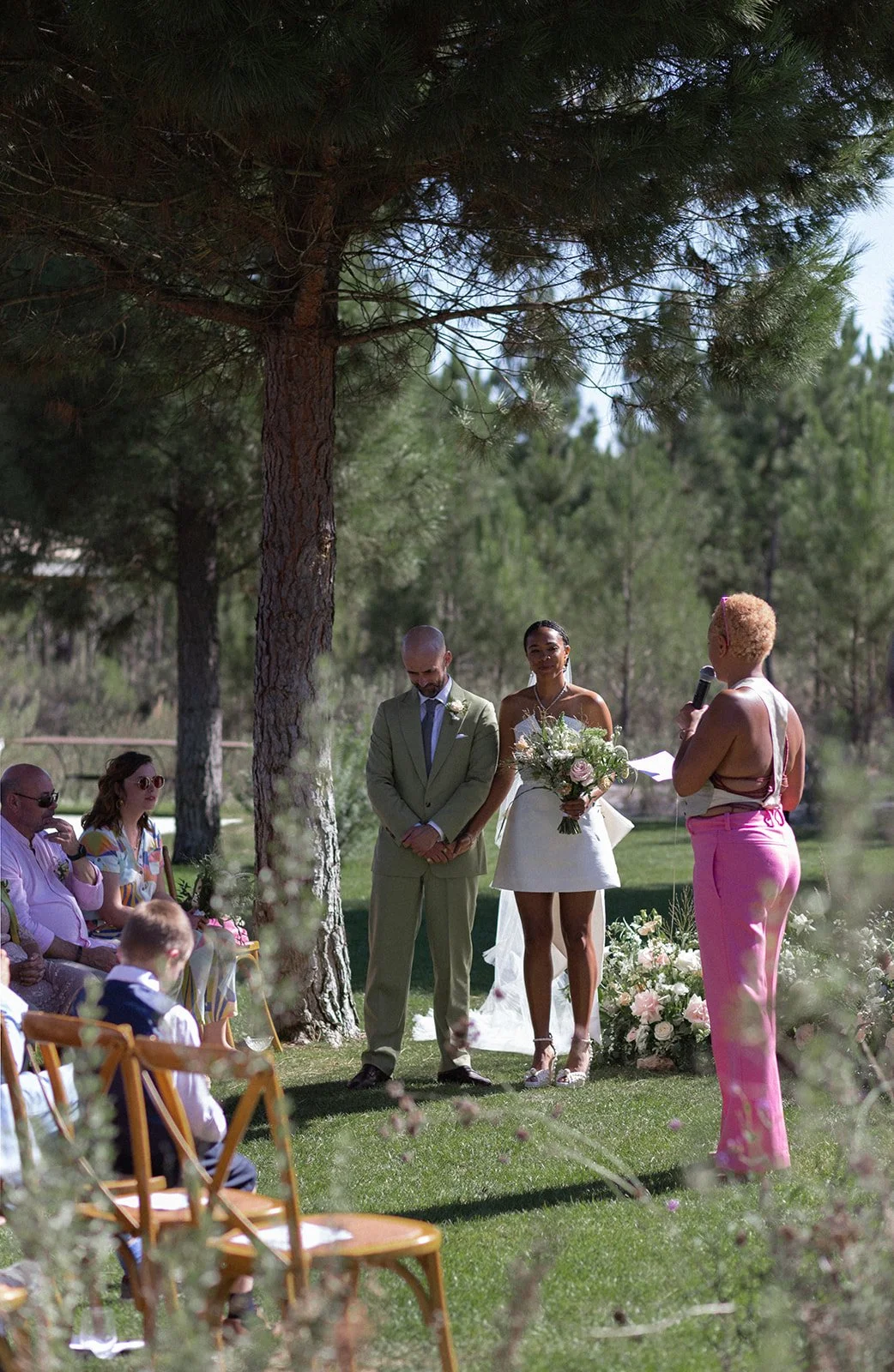 Outdoor ceremony under pine trees at Comporta private estate, Portugal, editorial photography by The Lopes Photography