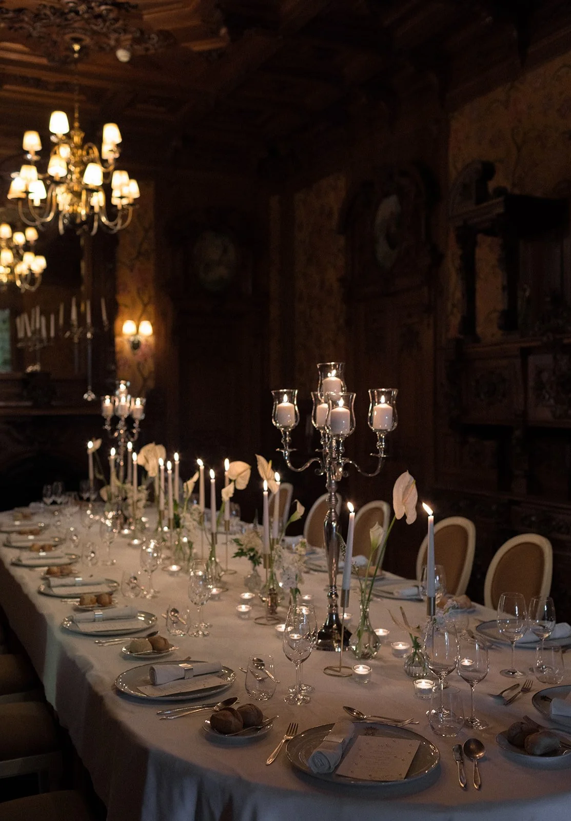 Formal dining table with silver candelabras in ornate palace venue, luxury wedding venues algarve by The Lopes Photography