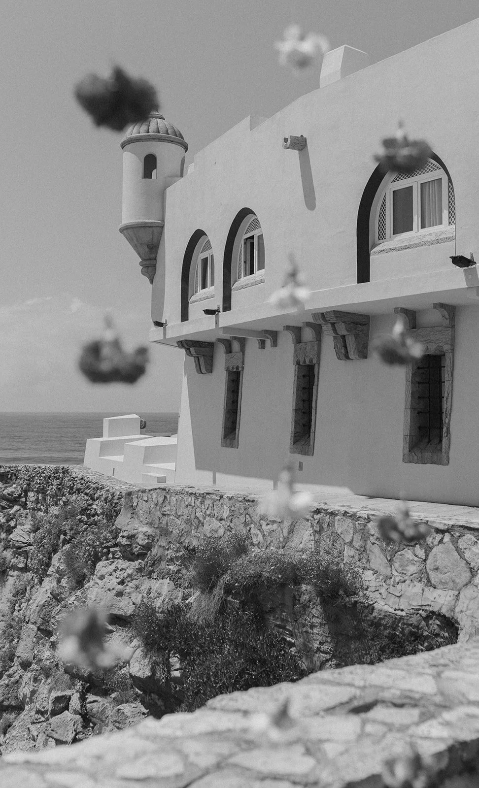 Fortaleza do Guincho on its rocky Atlantic cliff, a dramatic destination wedding venue in Portugal | by The Lopes Photography