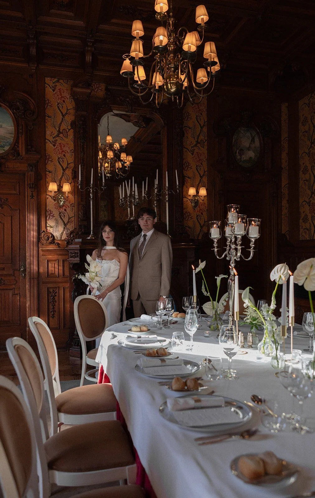 Couple in ornate candlelit palace dining room, luxury wedding venues algarve by The Lopes Photography