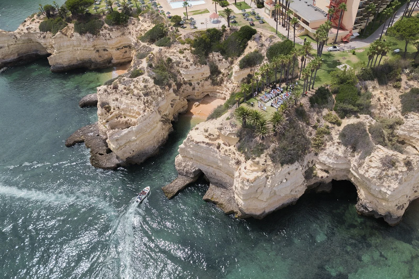 Drone view of wedding ceremony on the Algarve coast, Portugal | destination wedding photography by The Lopes Photography