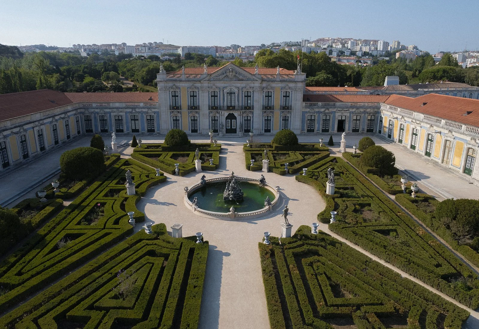 Aerial view of Palácio de Queluz and its formal baroque gardens, luxury destination wedding venue in Portugal