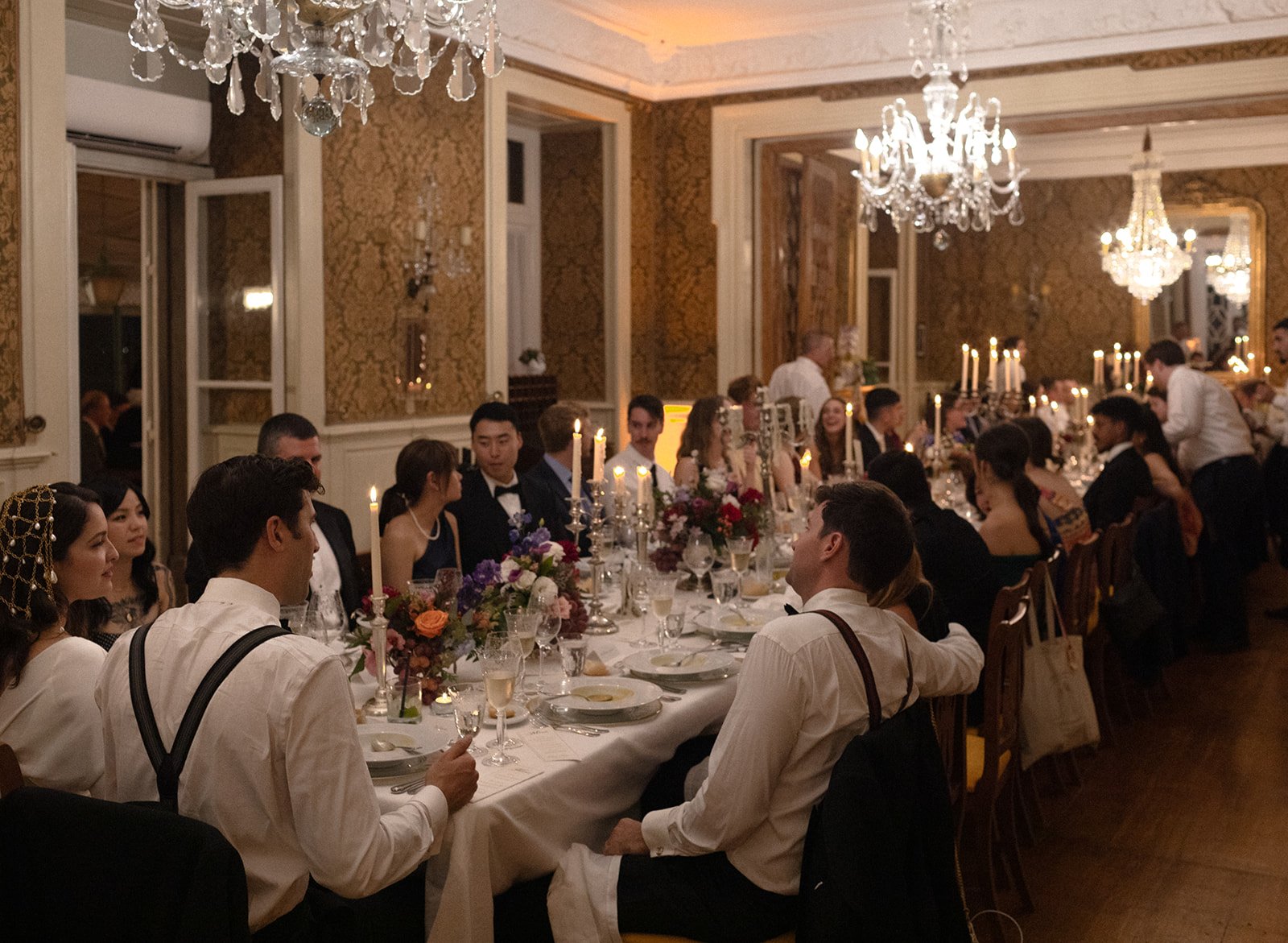 Reception atmosphere at a destination wedding in Portugal with architecture, table design, and evening light