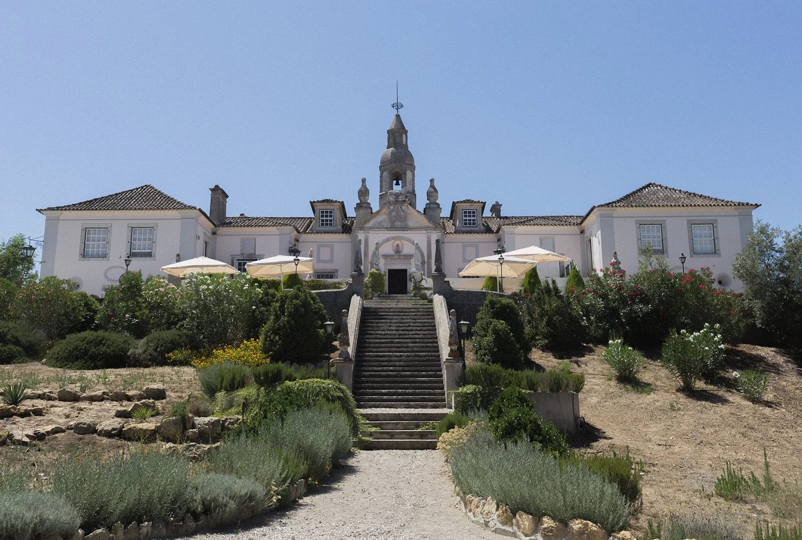 Stone staircase and Baroque chapel tower at Quinta da Conceição, Azeitão Portugal | destination wedding photography by The Lopes Photography