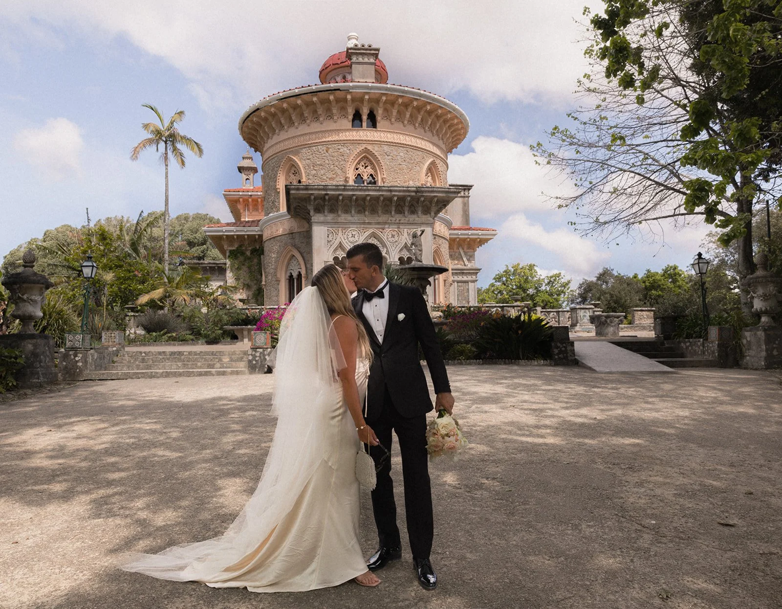 Wedding couple in front of Palácio de Monserrate in Sintra, Portugal, photographed by a destination wedding photographer