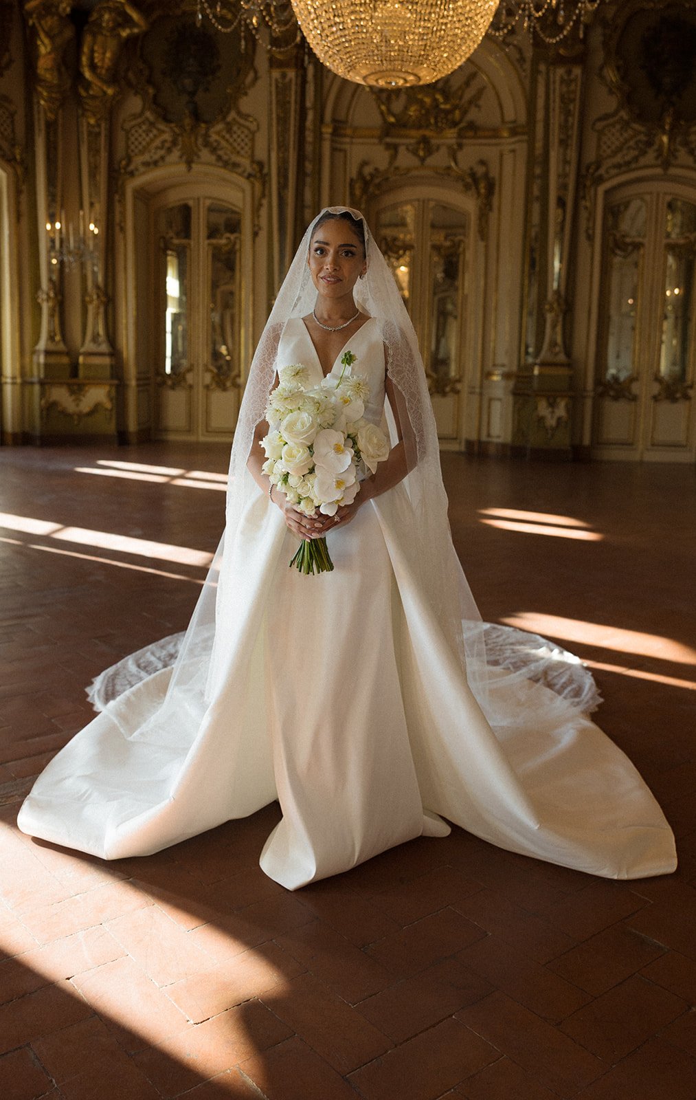 Bride in the gilded ballroom at Palácio de Queluz, natural light, editorial photography by The Lopes Photography