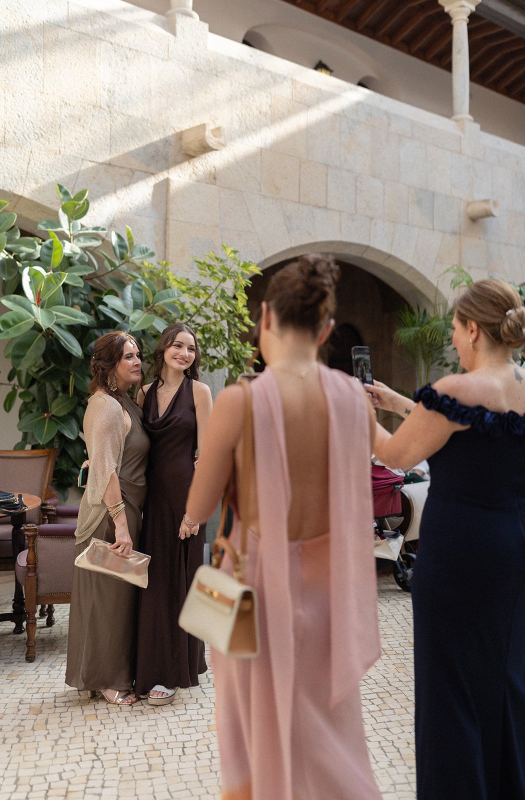 Wedding guests enjoying cocktail hour at Fortaleza do Guincho