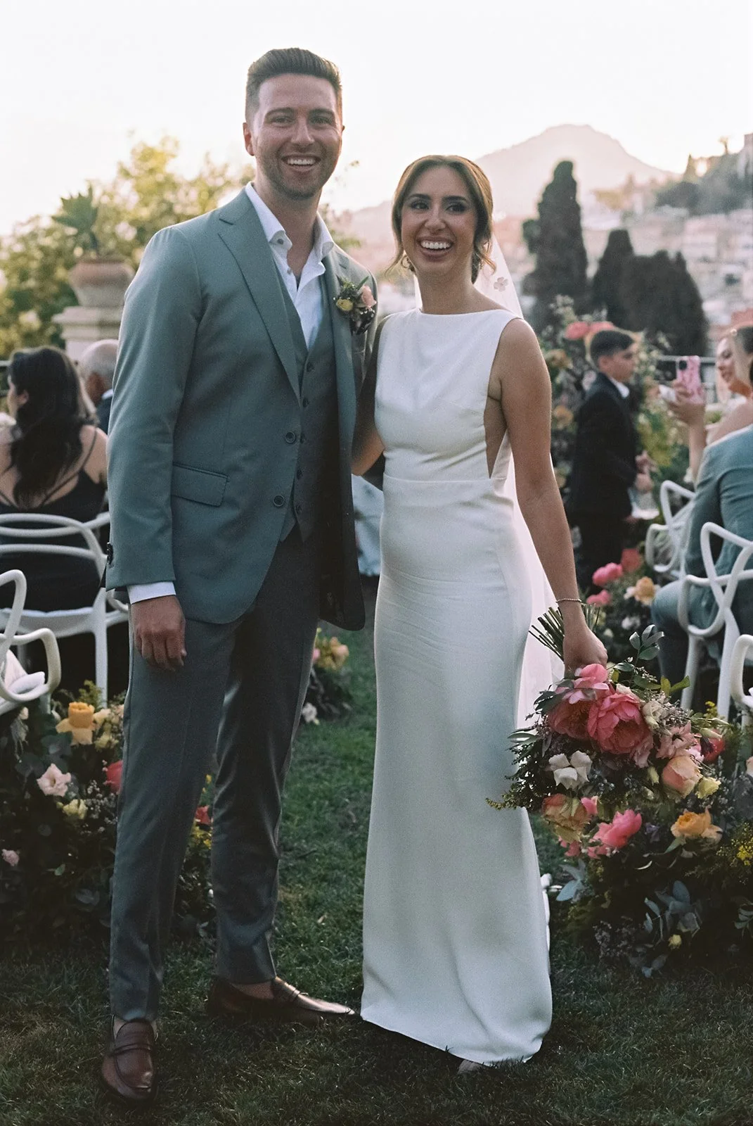 Bride and groom smiling together moments after their ceremony at Grand Hotel Timeo, Taormina | The Lopes Photography