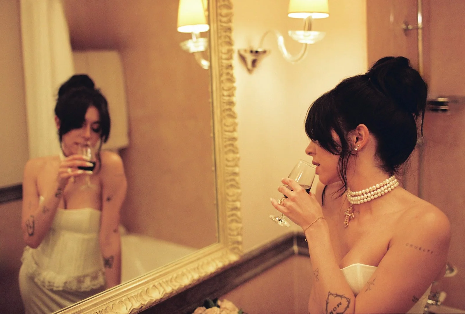 Bride in ornate gold mirror during getting ready at Palácio de Seteais, editorial photography by The Lopes Photography