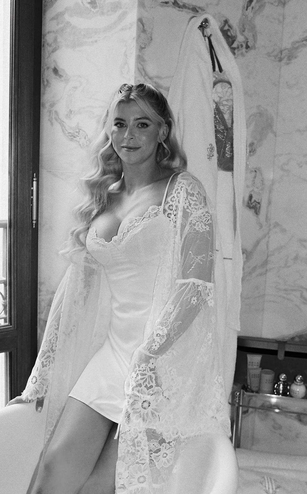 Bride in lace robe during wedding preparation at Grand Hotel Tremezzo, Lake Como, Italy, destination wedding photography — The Lopes Photography