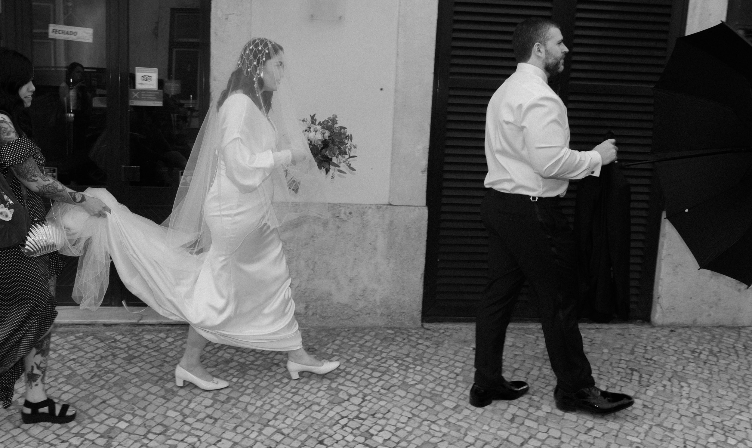 bride walking through the city in Lisbon