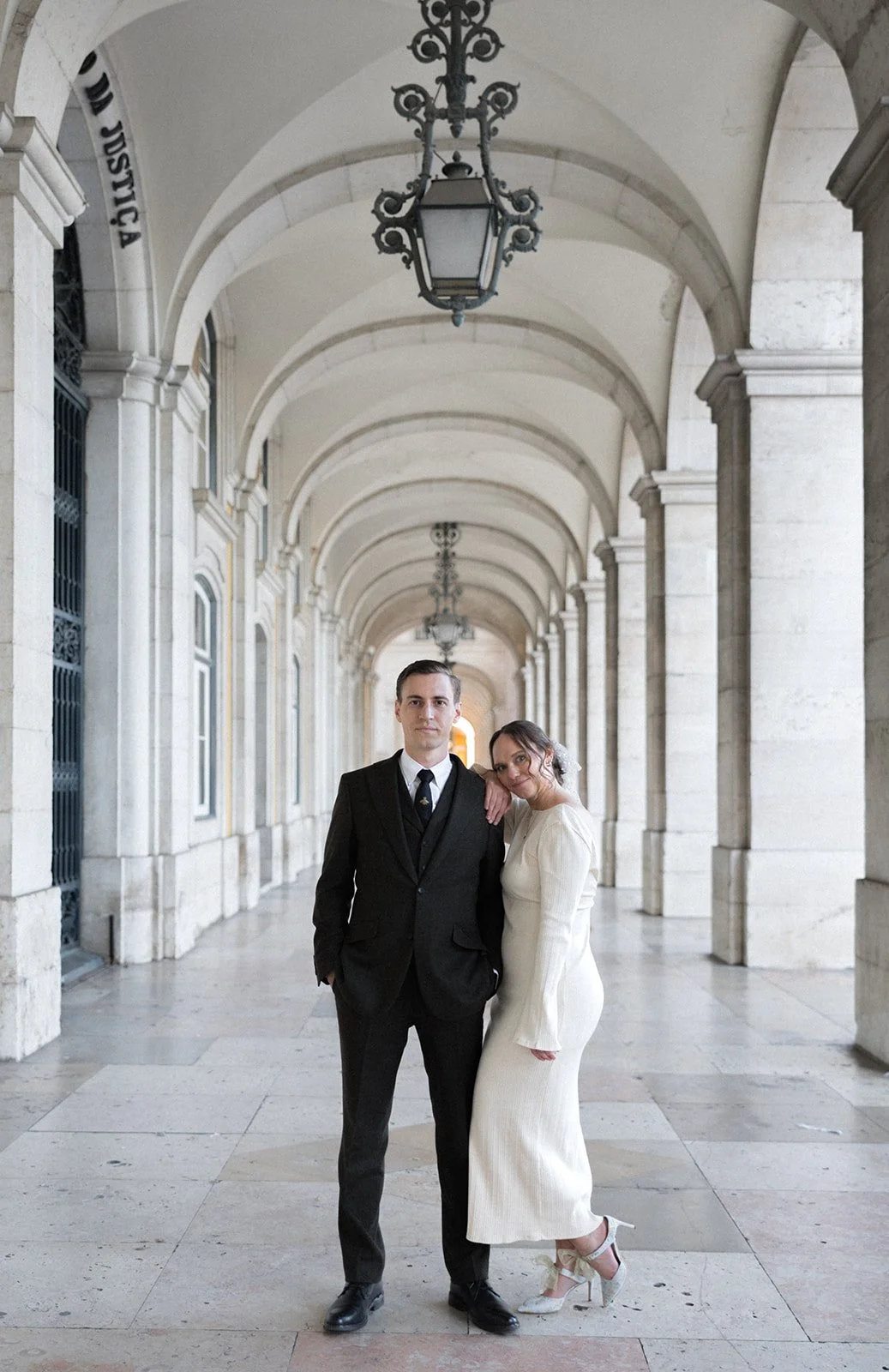 The Lopes Photography guiding a couple during portraits in Portugal with a calm editorial approach