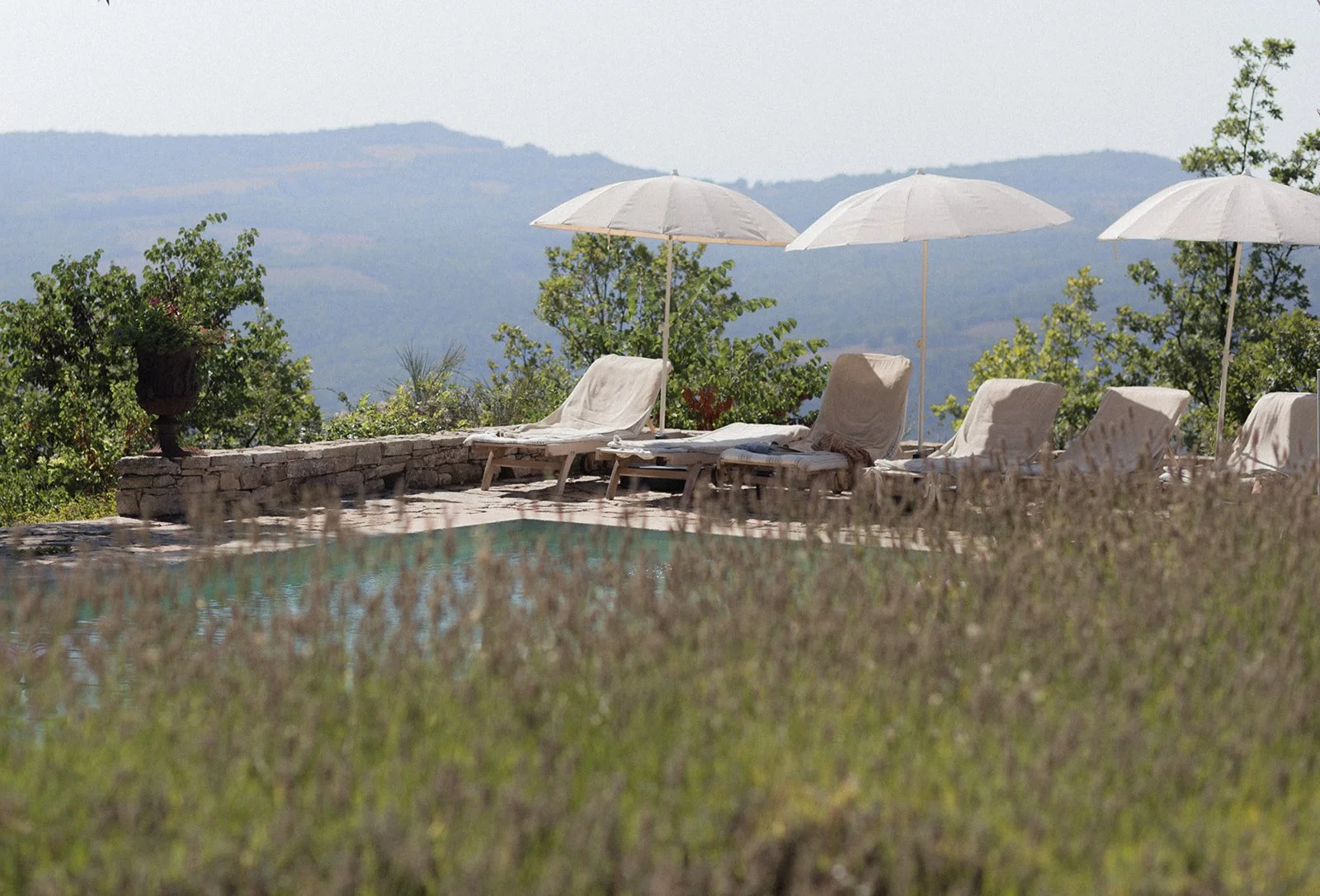 Le Grand Banc wedding venue in Provence, pool terrace with lavender and panoramic views of the Luberon | The Lopes Photography
