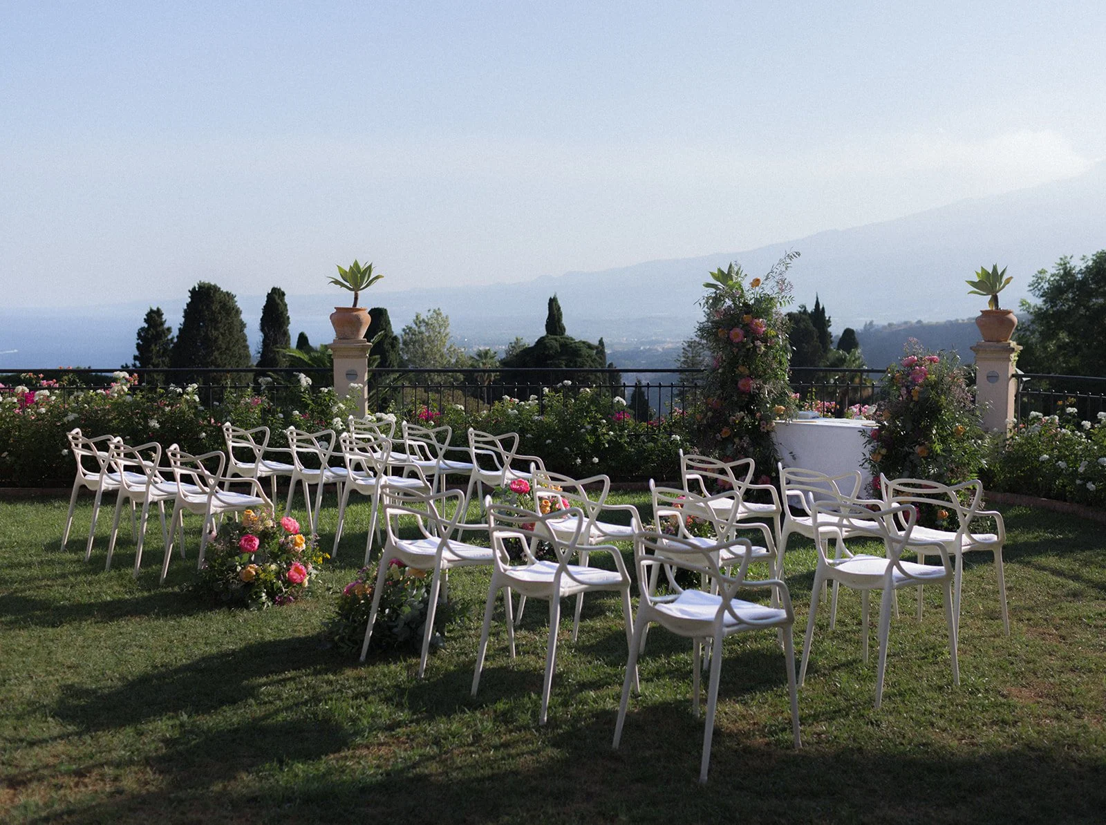 Wedding ceremony setup at Grand Hotel Timeo with Mount Etna in the background, Taormina Sicily | The Lopes Photography