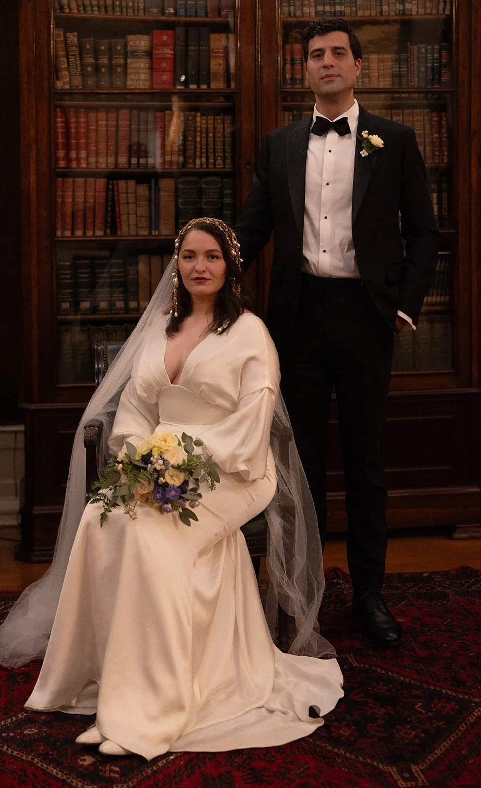 Bride and groom posing side by side in an editorial style at Grémio Literário in Lisbon, Portugal
