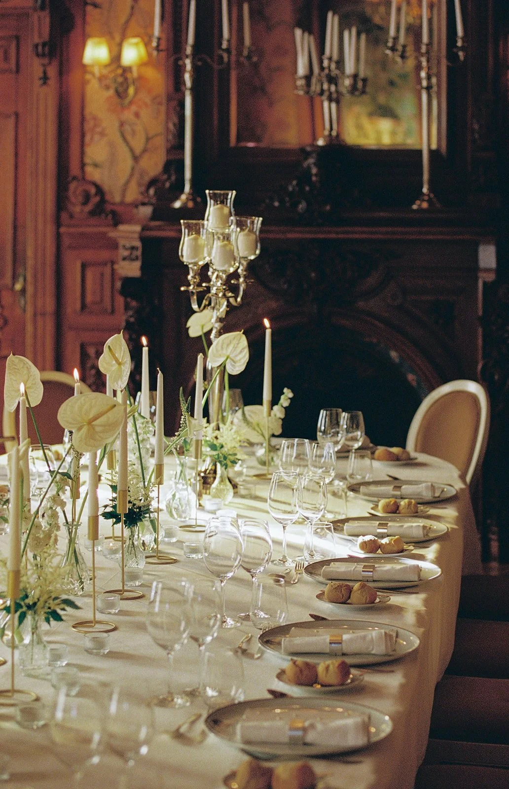 Elegant candlelit reception table in ornate palace interior, luxury wedding venues algarve by The Lopes Photography