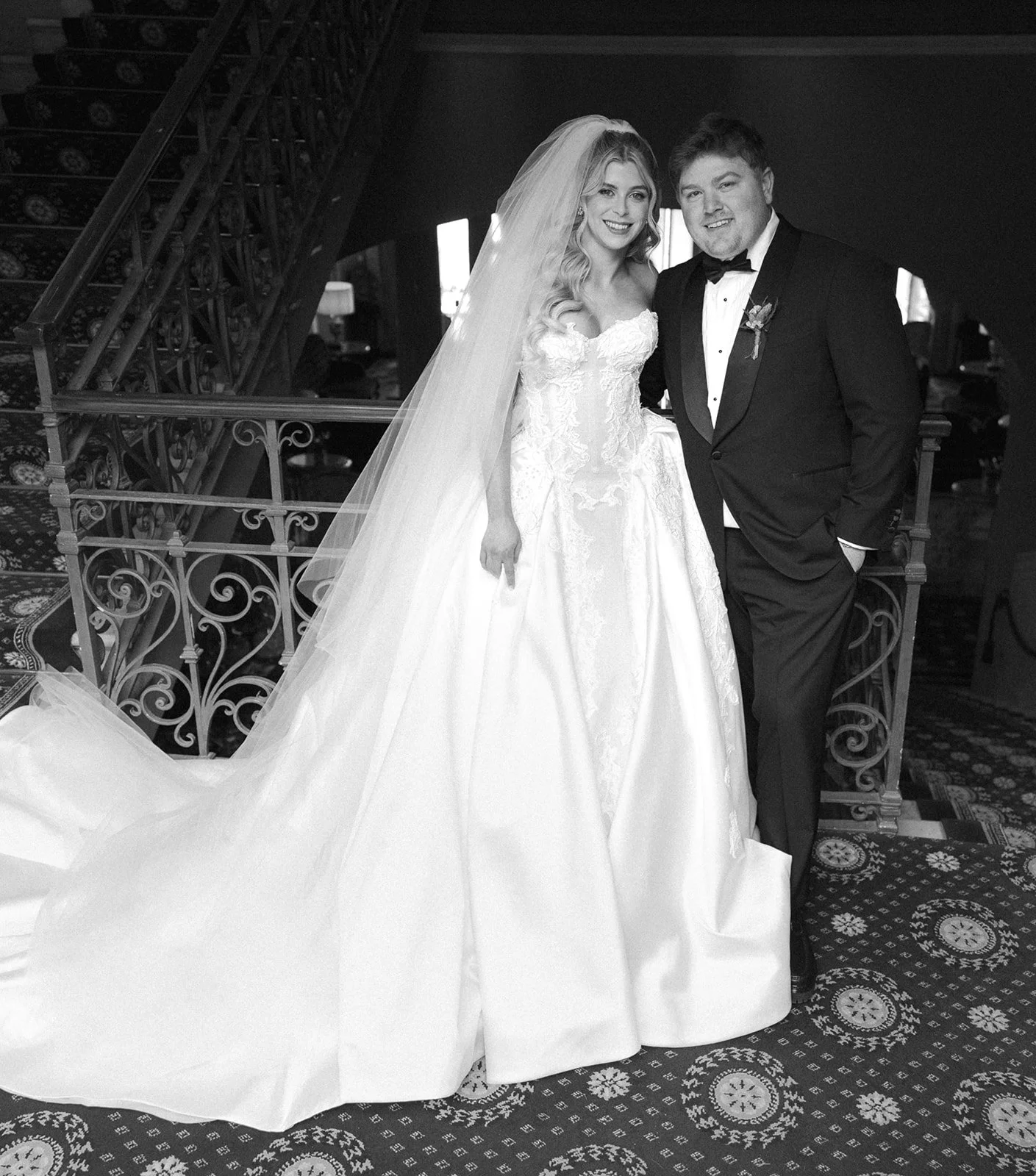 Couple's first look moment on the grand staircase at Grand Hotel Tremezzo, Lake Como, Italy, destination wedding photography — The Lopes Photography