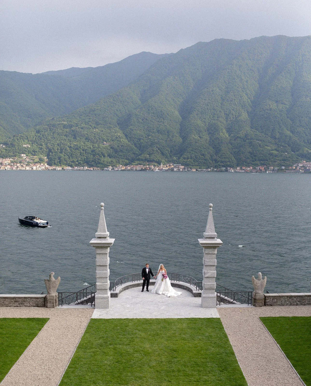 Couple hand in hand on a lakeside terrace, Villa Balbiano, Lake Como, wedding photography by The Lopes Photography
