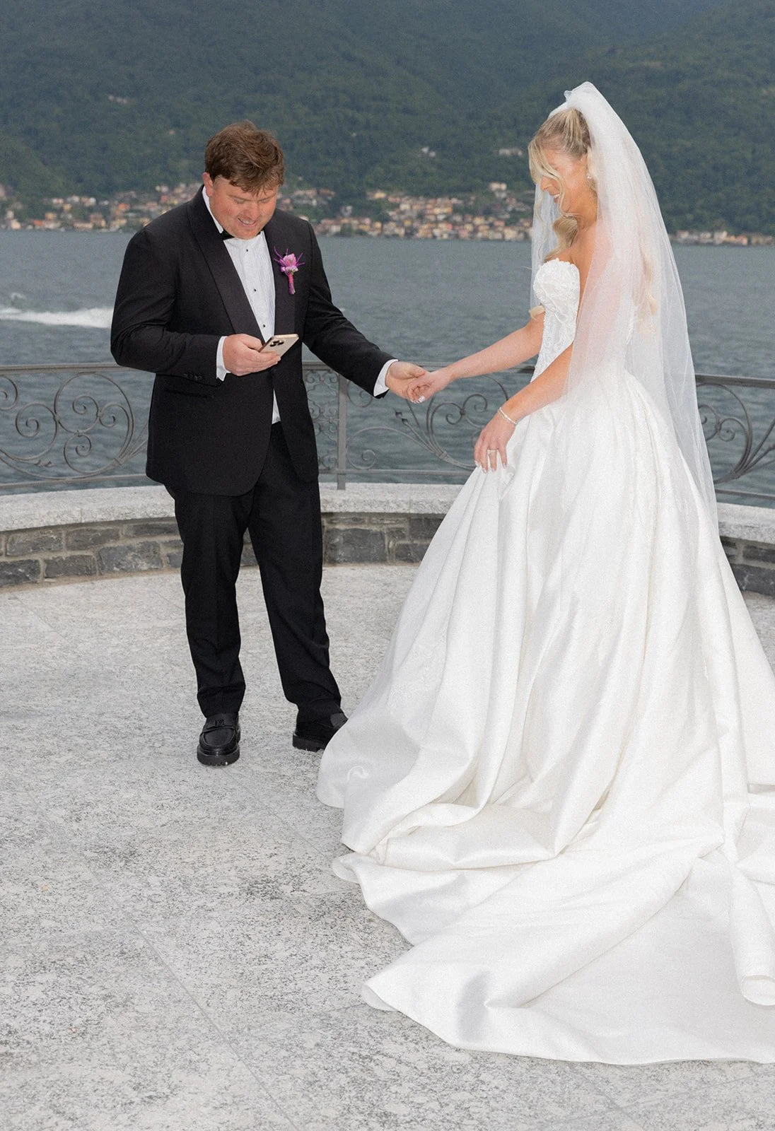 Groom reading vows from a card on the terrace, Villa Balbiano, wedding photography by The Lopes Photography
