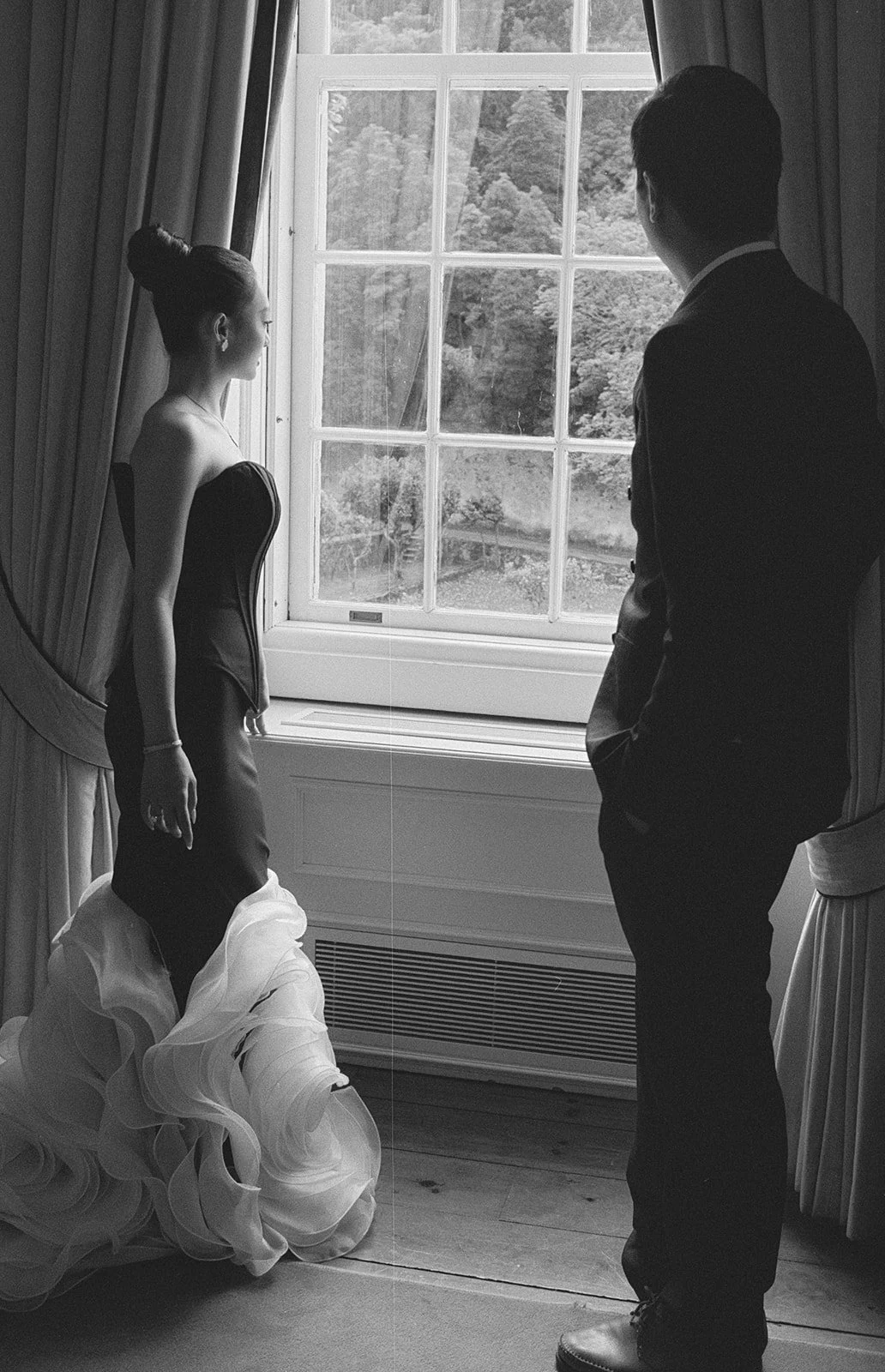 Couple silhouetted at tall palace window, Palácio de Seteais Sintra, editorial wedding photography by The Lopes Photography