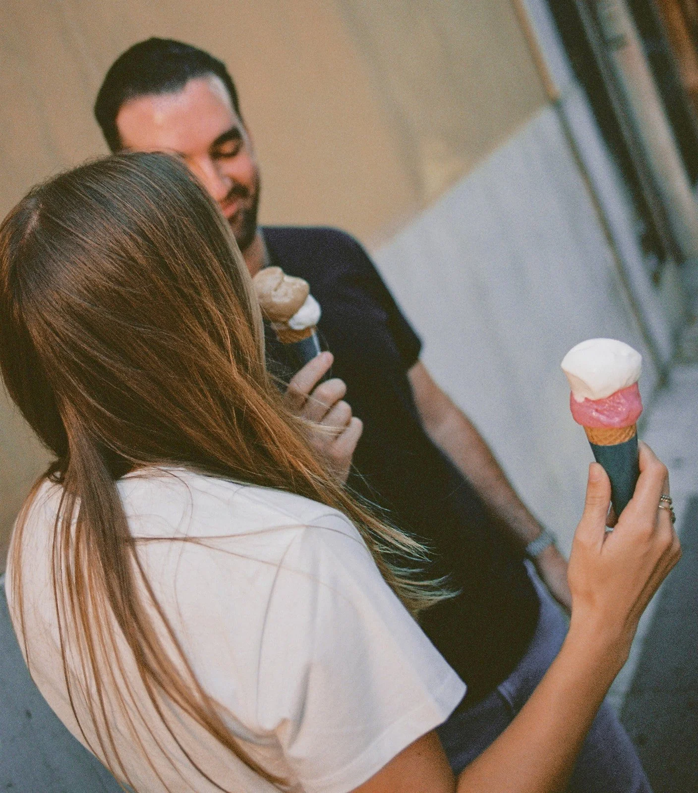 Photo of an engagement couple eating gelato