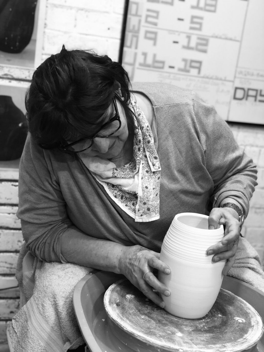 Maria working on her art