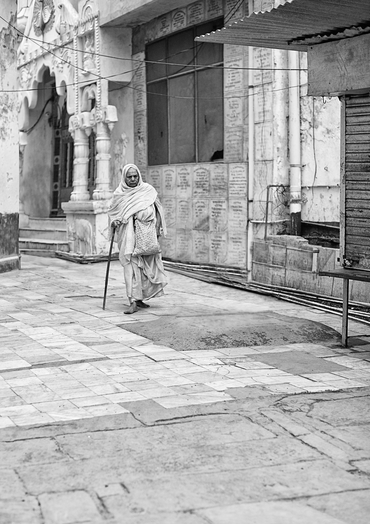 widows of vrindavan :: walking to the temple.jpg