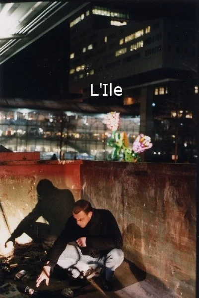 looking for a cellphone in a dumpster (from L'Ile).jpg
