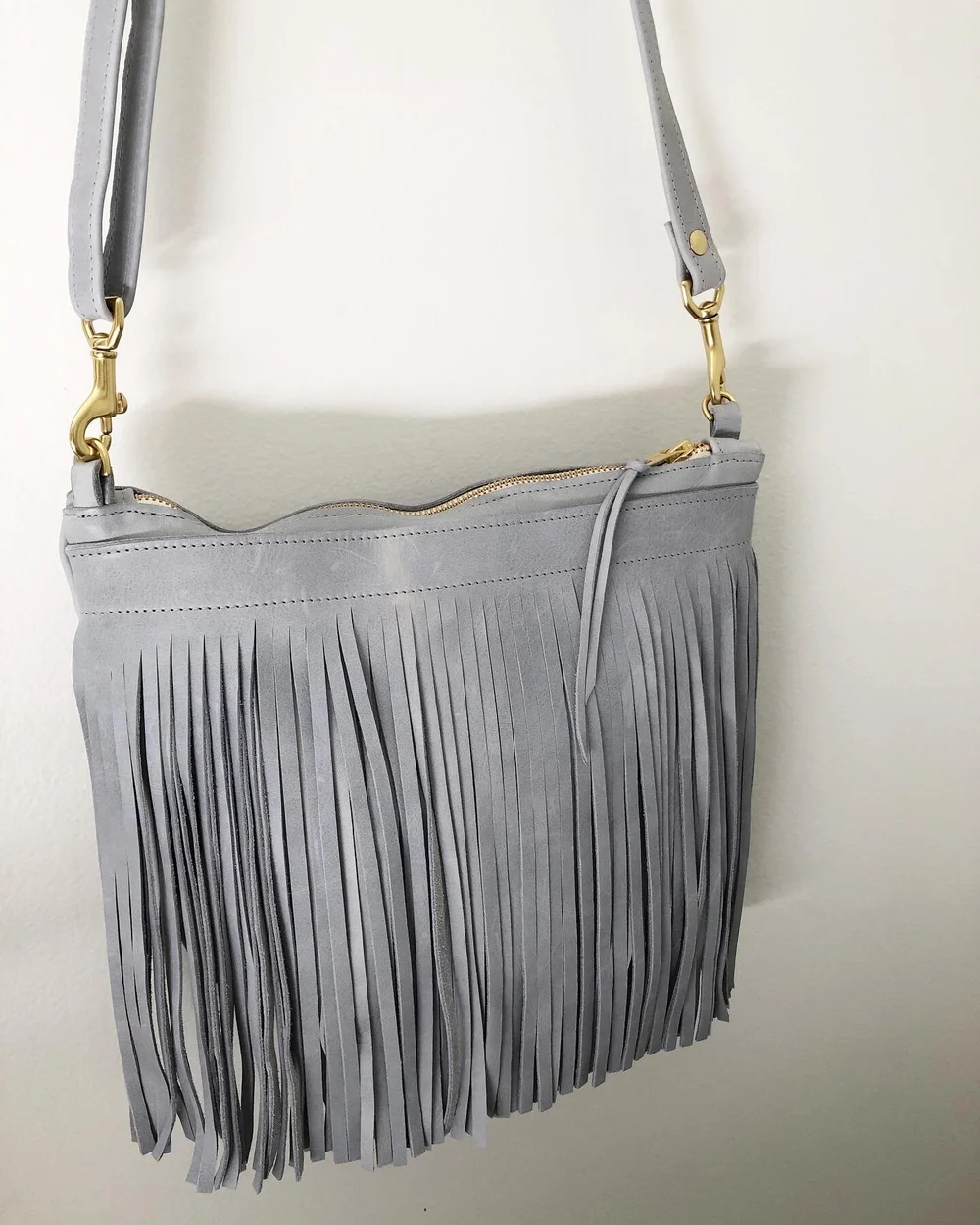 Soft blue leather fringe purse Amahle Designs