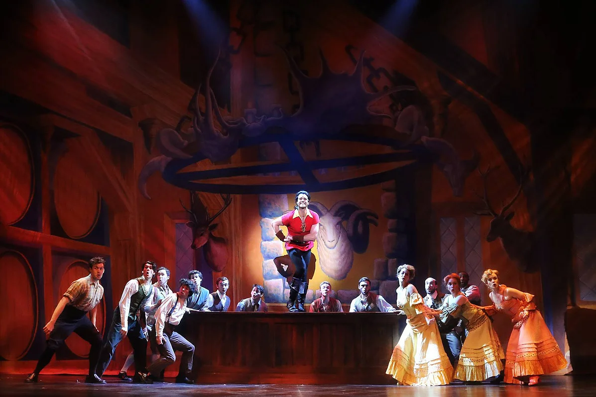  Pictured: Peter Saide (Gaston) and the cast of Disney's BEAUTY AND THE BEAST.  Photo by Curtis Brown Photography. 