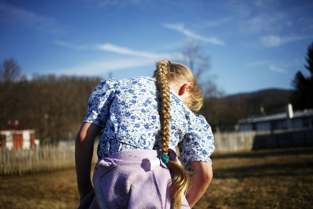   Katie Currid . March 8, 2014. Rachel Hartzler, 7, takes a minute in between sessions of playing tag behind the Sugar Tree Country Store during the Highland Maple Festival in McDowell, Highland County, Virginia. The families of the children were at 