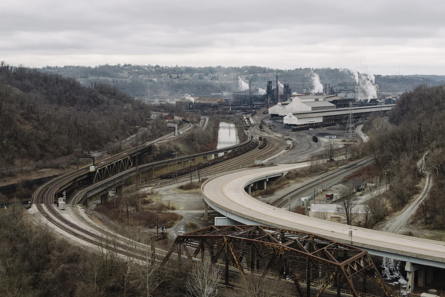 Kristian Thacker . Looking over the end of the Turtle Creek Valley where it flows into the Monongahela next to the Edgar Thomson Steelworks from the George Westinghouse Bridge. Turtle Creek, Allegheny County, Pennsylvania.