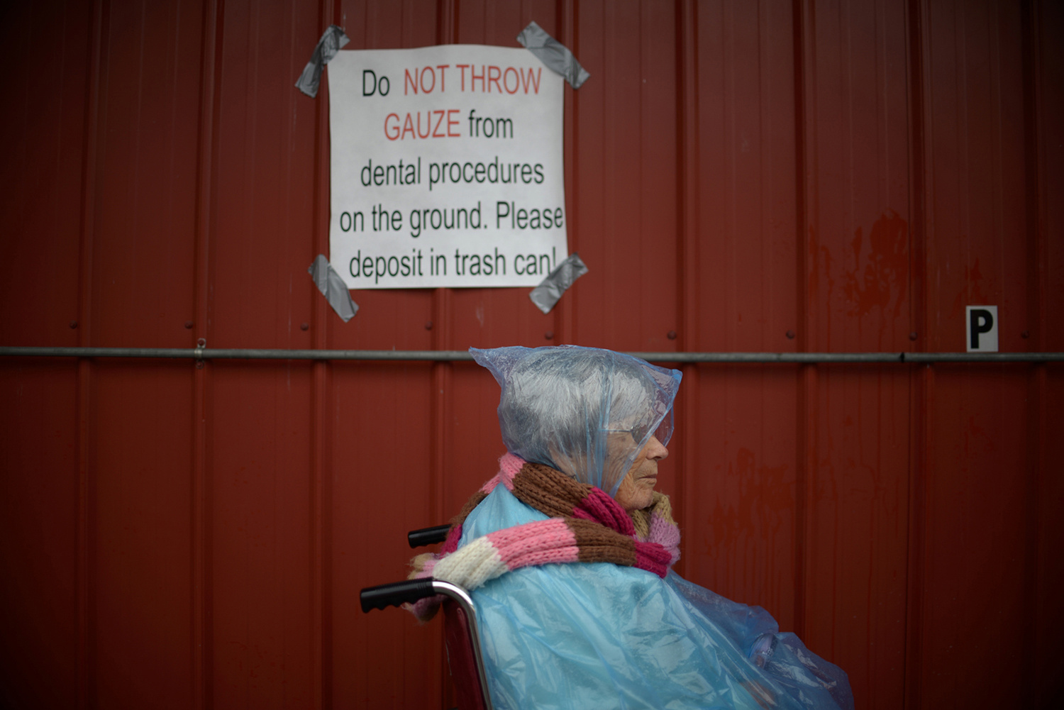 Pat Jarrett / The Virginia Folklife Program . July 19, 2014. Mildred Honaker of Honaker, 93, waits in the rain for her appointments. Wise, Wise County, Virginia.