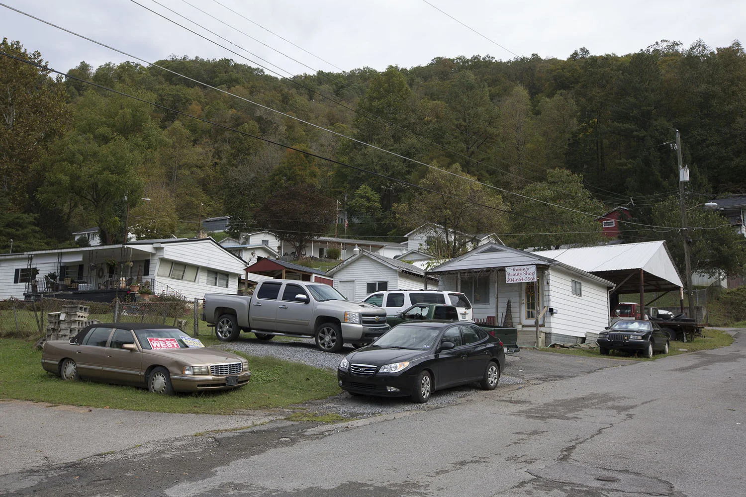 Chris Jackson . October 9, 2014. Robin's Beauty Shop sits in a small neighborhood in Gilbert, Mingo County, West Virginia). (First published in The Boston Globe on October 13, 2014.)
