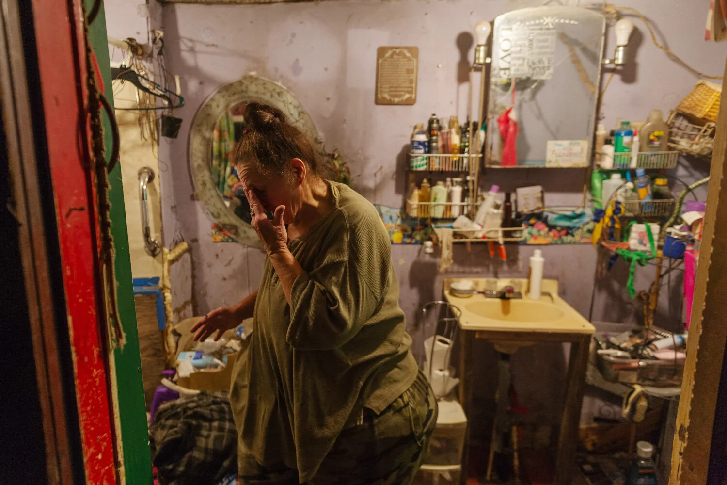   Craig Hudson . June 27, 2019. De Hanshaw rubs her eyes in the bathroom of her home in Drennen, Nicholas County, West Virginia. In January 2019, the Hanshaws signed a contract with RISE West Virginia, a $150 million federal relief program to provide