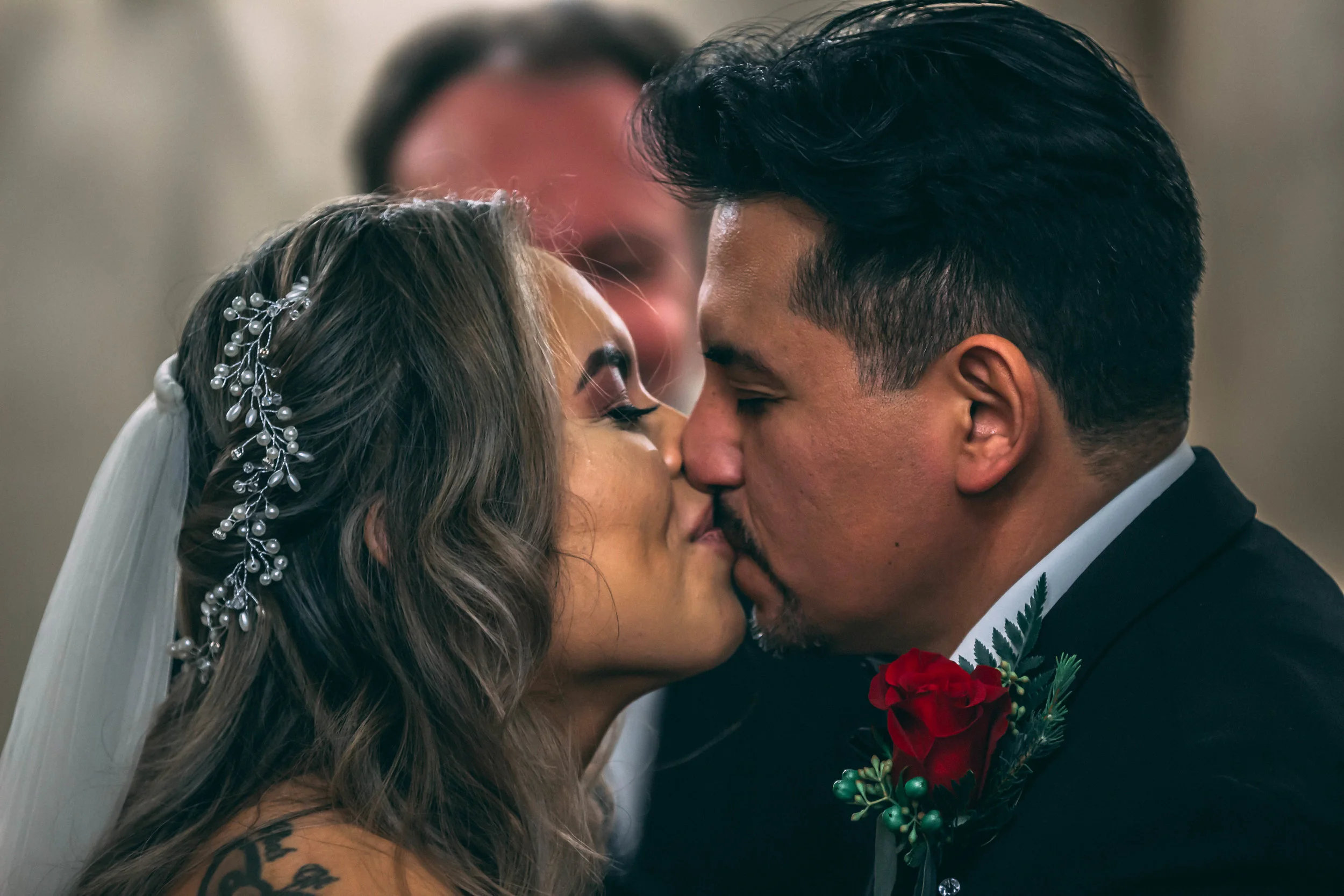 Close-up portrait of a bride and groom kissing, wedding photography by Everlux Photo Co.
