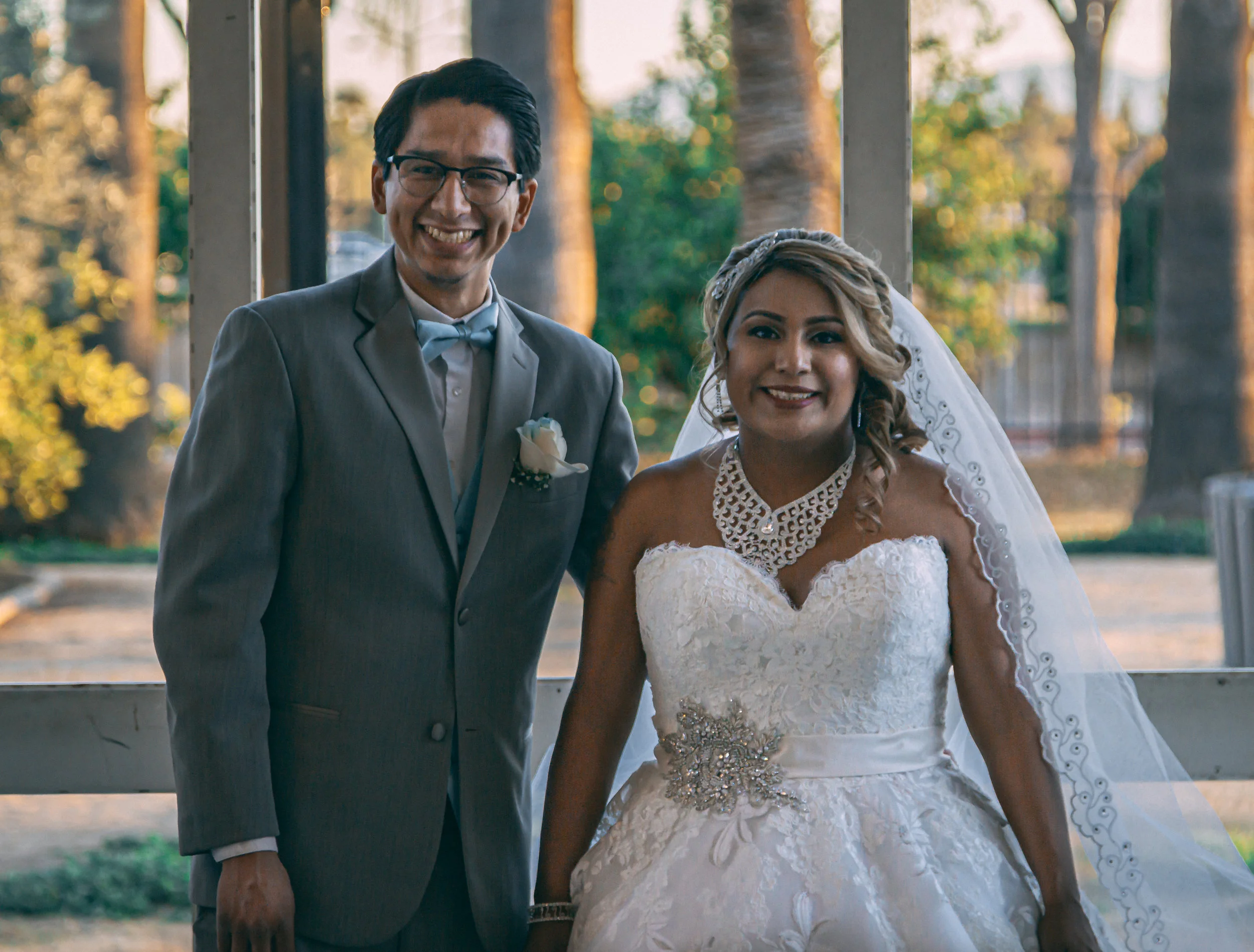 Formal portrait of a bride and groom posing together, wedding photography by Everlux Photo Co.