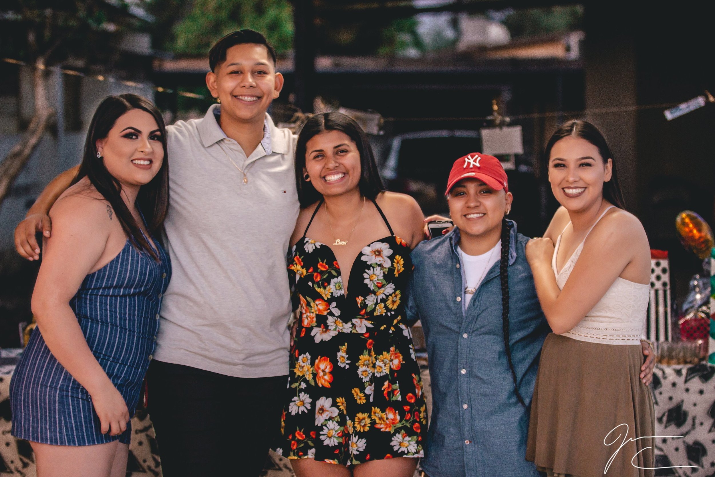 Group portrait of five family members at an outdoor evening gathering, family photography by Everlux Photo Co.