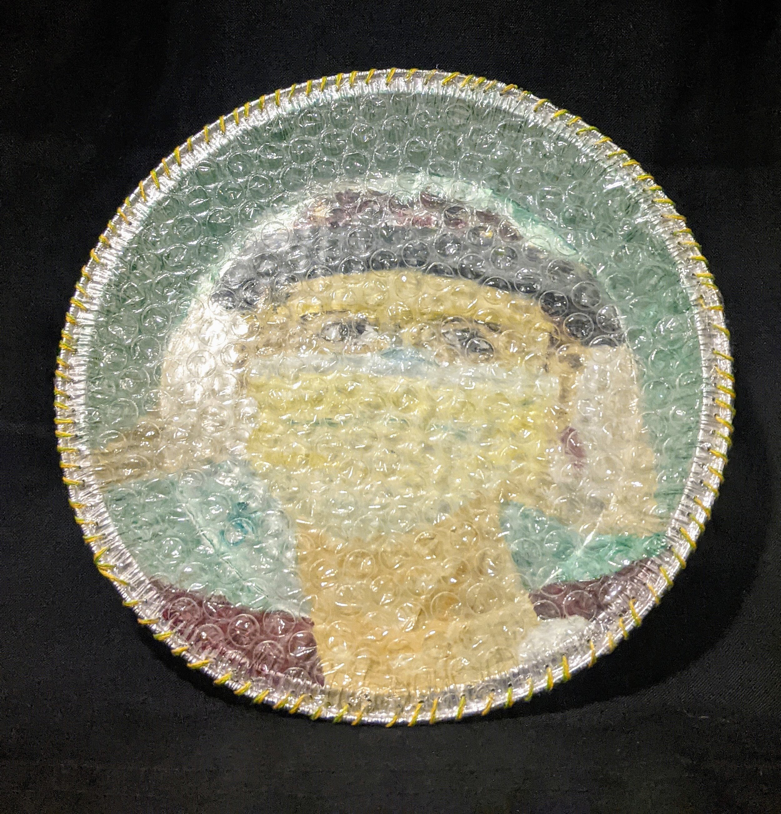 Gail S. Kotel One of My Covid Heroes Oil On Take Out Tin, Bubble Wrap, Laynard 9 diameter 2021.jpg