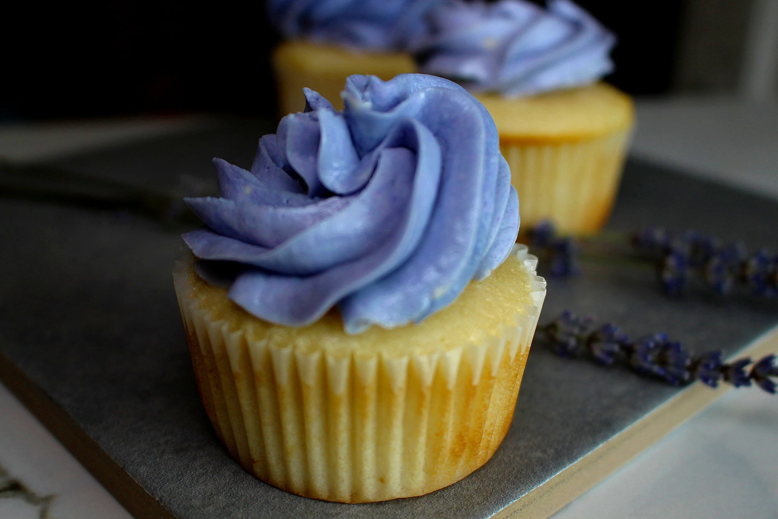 White/ Vanilla Bean Cupcakes with lavender buttercream icing.