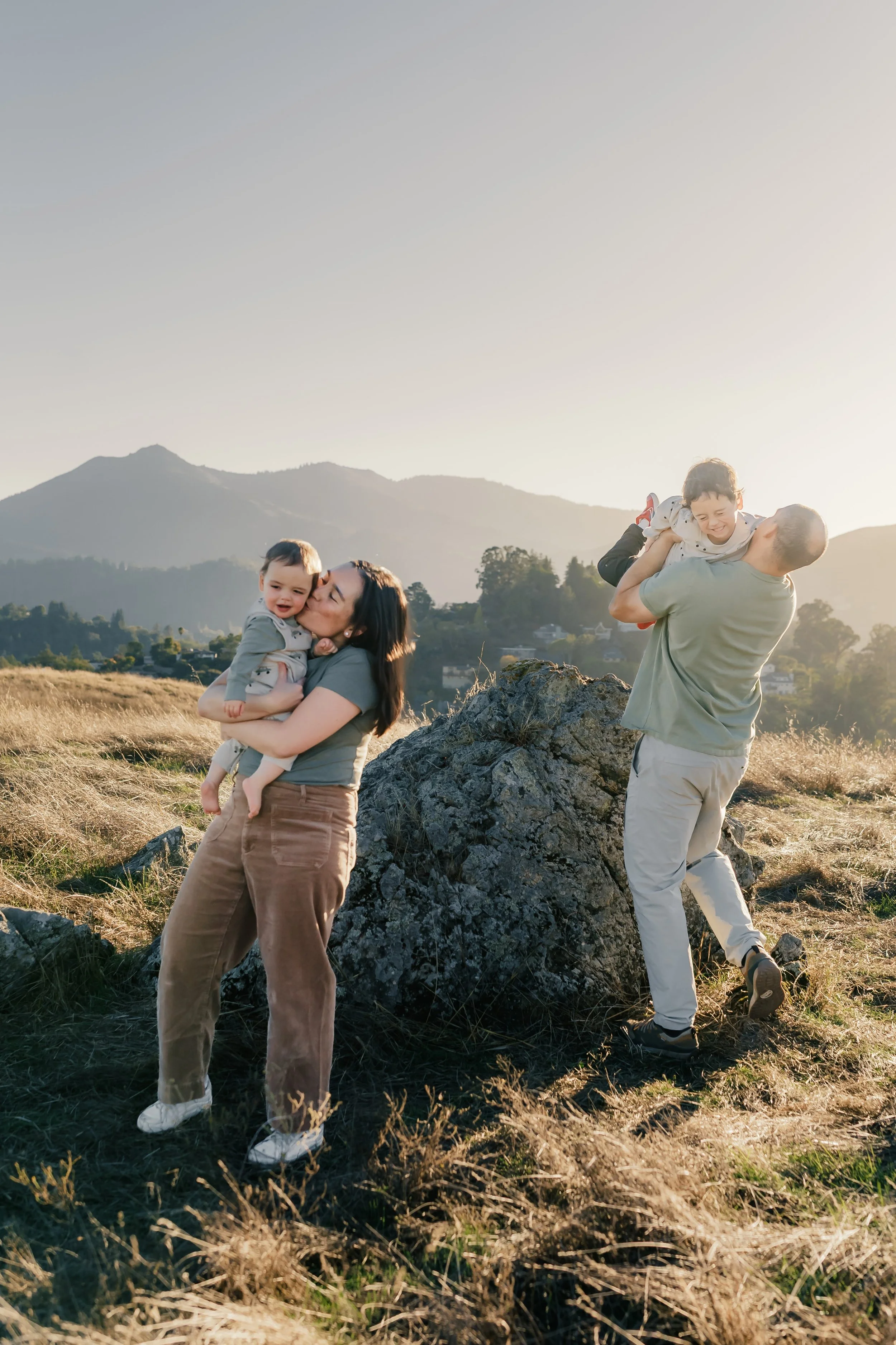 Authentic family moment during a Marin County mini session with baby and young children..jpeg