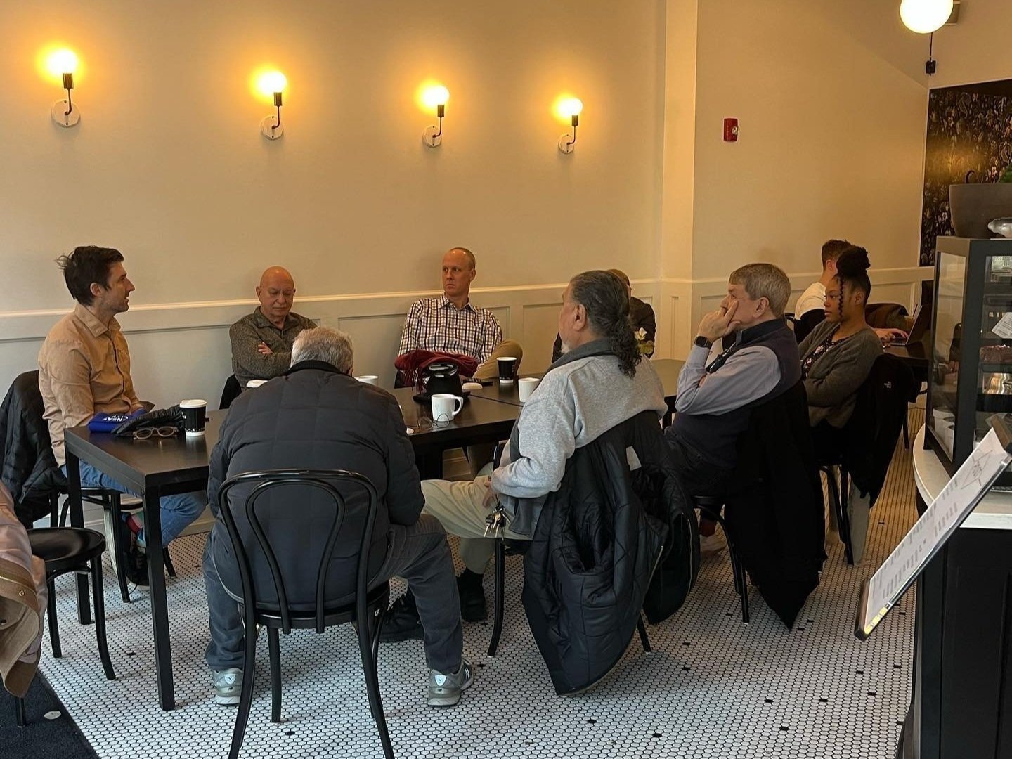 Hosted monthly community coffee meetings