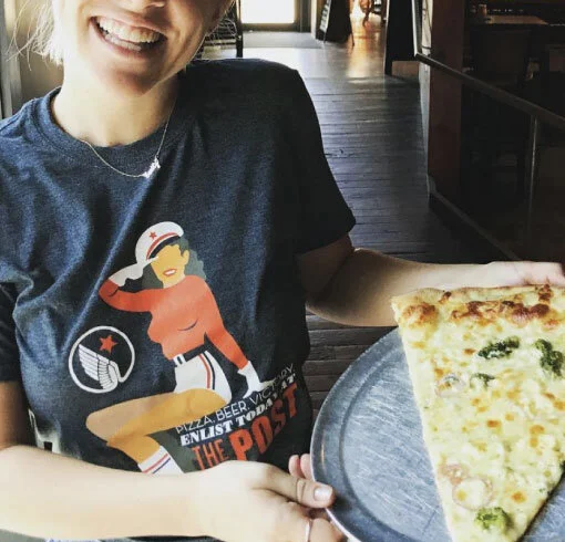 T-shirt alongside 'za for enhanced flavor