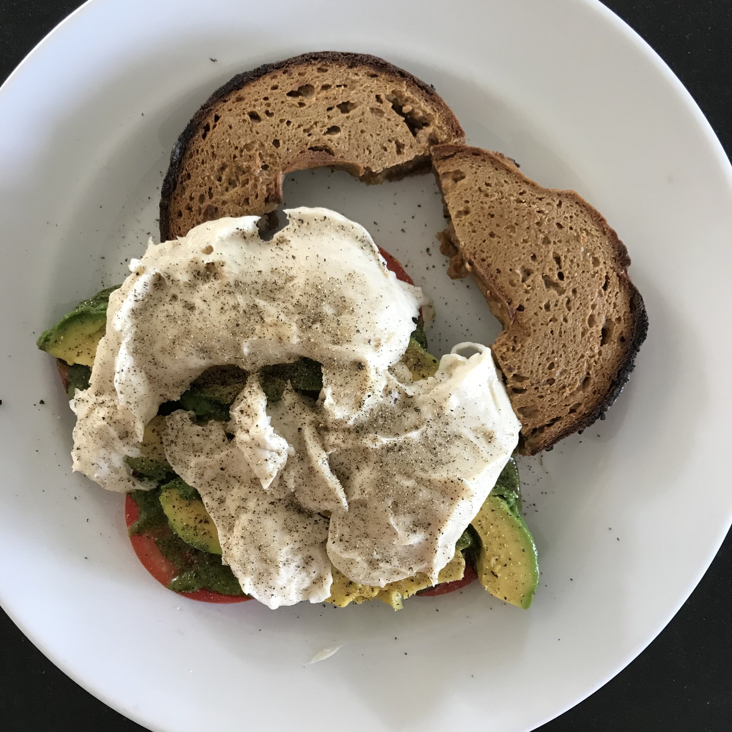 A Rich Assortment Of Deliciousness ... Cashew Nut 'Mozzarella Cheese,' Tomato, Pesto And Avocado With A Grain Free Bagel!