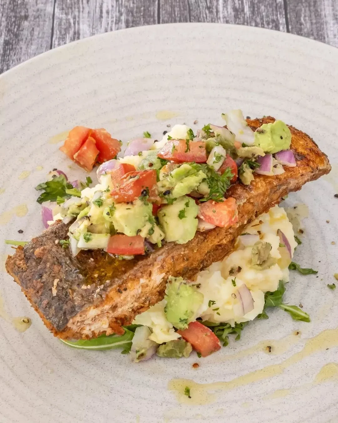 Looking for something fresh? Then this one&rsquo;s a winner.

Our Cajun Salmon comes with creamy mash, fresh rocket, and a punchy avocado salsa on top. Crispy skin, proper seasoning, and just enough kick to keep things interesting.

It&rsquo;s the ki