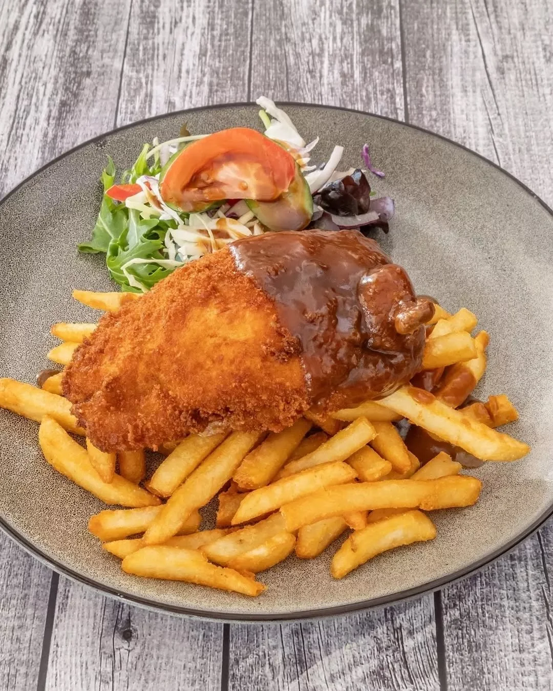 If your brain&rsquo;s been screaming CHICKEN all week, this is your sign to listen to it.

Golden kiev. Garlic butter everywhere. Gravy poured with zero restraint. Chips on the side keeping the whole operation honest.

Not saying it&rsquo;ll fix your
