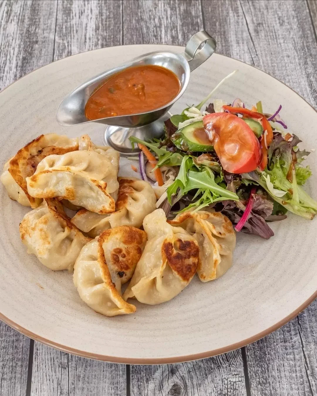 Not every feed needs to send you straight into a food coma.

Handmade kothay dumplings, golden on the outside, soft in the middle, and served with a sauce that absolutely understood the assignment.

Easy to share&hellip; but also very easy to gatekee